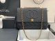 Chanel Flap Bag in Black Grained Calfskin with Gold-Tone Metal Hardware