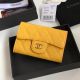 Chanel Calfskin and Gold-Tone Metal Card Holder A80799 Yellow