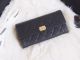 Black and Gold-Tone Metal Boy Chanel Flap Wallet A80286