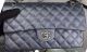 Chanel 2.55 Series Flap Bag in Black Caviar Leather with Silver Hardware - A05480