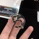 Chanel Signature Brooch with Classic CC Logo in Gold Tone Metal