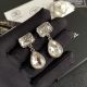 Fake Chanel Earrings with Classic CC Logo Design